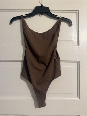 Revamped Brown One-Piece Bodysuit